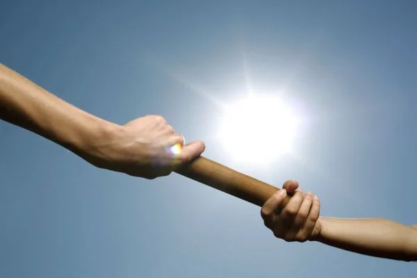 relay race baton handoff